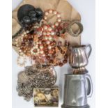 A collection of costume jewellery to include silver and white metal chains, bangle,  beaded
