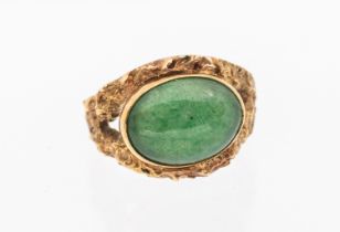 Richard Bonehill- a jadeite set 9ct gold ring, set with an oval cabochon jadeite approx 10x13mm,
