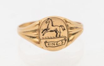 A 9ct gold signet ring, oval top engraved with horse 'King S' ridged shoulders, width approx 10mm,