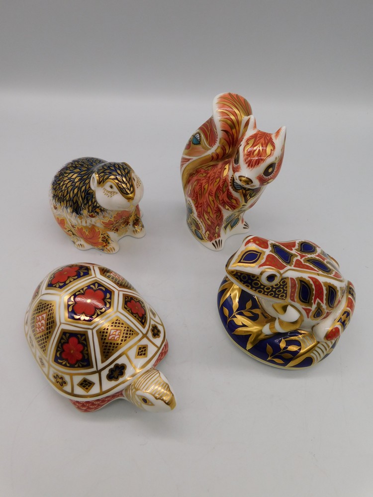 Four Royal Crown Derby paperweights to include: Riverbank Beaver, Woodland Squirrel, Frog and