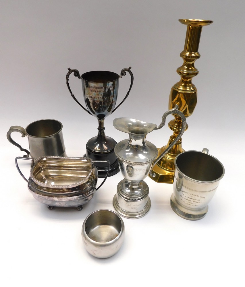 A collection of silver plated items to include tea sets, trophies and tankards , also included in