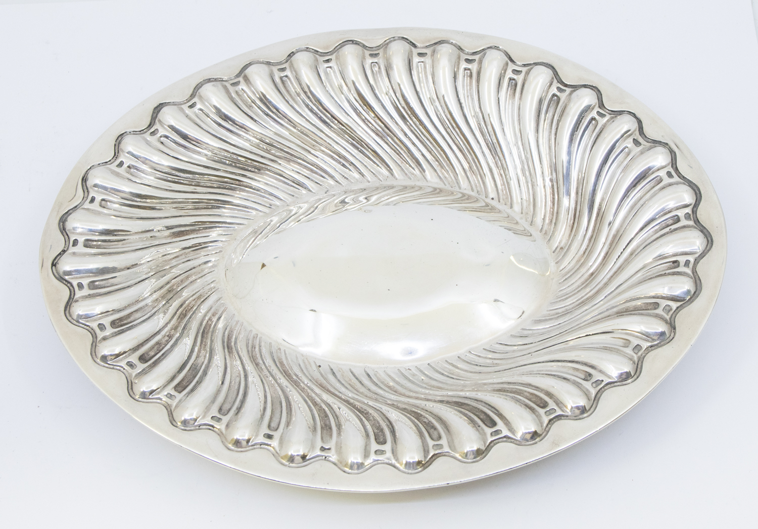 A Victorian silver oval dish, of swirled gadrooned design with slight planishing to back, hallmarked