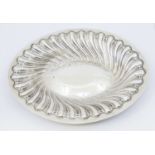 A Victorian silver oval dish, of swirled gadrooned design with slight planishing to back, hallmarked