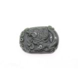 Serpentine/ nephrite jade pendant tablet depicting carp among waves. Size approx 4.5cm x 3.4cm x 1cm