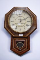 Two wall clocks, 8 day, one late 19th Century other mid 20th Century.