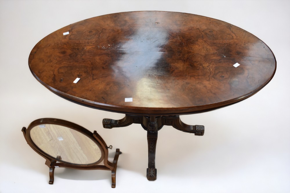A Victorian oval tilt top occasional burr walnut table on four splayed legs (bubbling to table - Image 2 of 2
