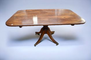 A Regency tilt top table in mahogany