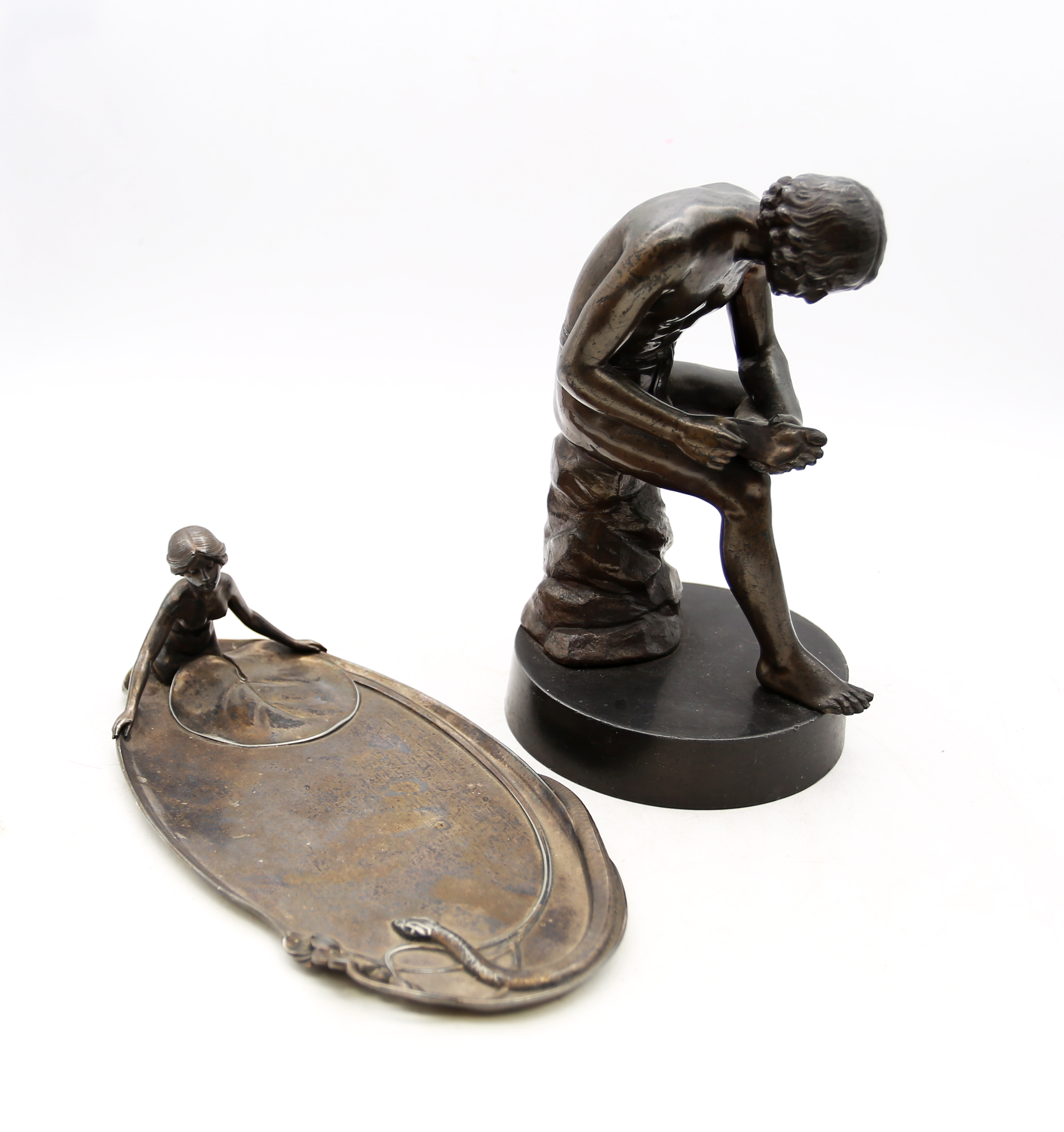 An early 20th Century WMF art nouveau pin dish along with a spelter figure of a classical man.