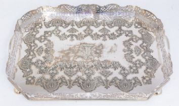 A large late 19th century/early 20th century silver plated serving tray with gallery surround and