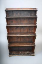 A 19th Century stained pine waterfall style five shelf book stand, 142cm x 82cm.