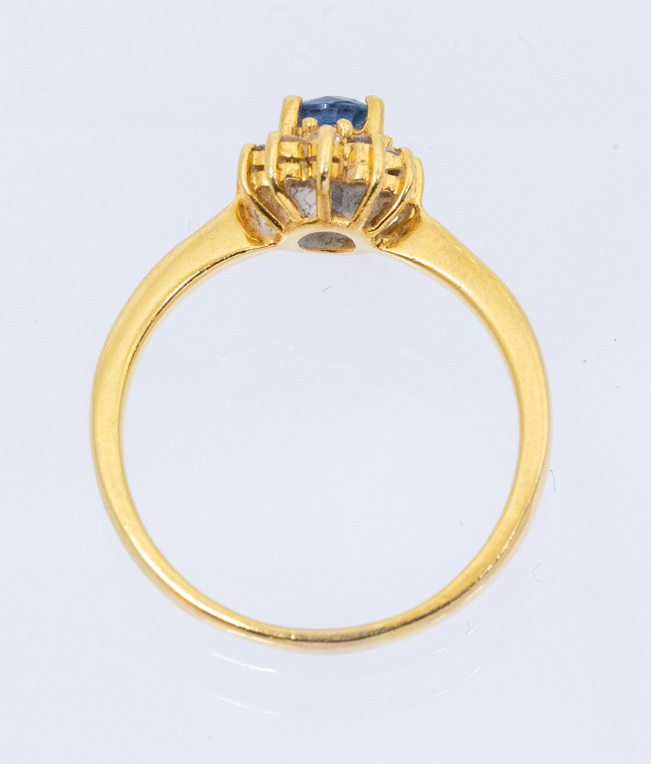 A sapphire and diamond 18ct gold cluster ring, set with an oval mixed cut sapphire approx 5x4mm, - Image 2 of 2