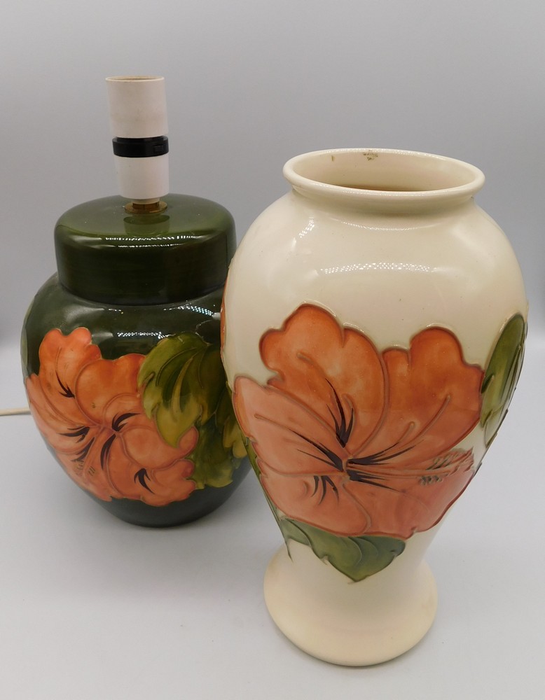 A 1980's Moorcroft vase in the Coral Hibiscus Ivory Design vase together with a 1970's Moorcroft