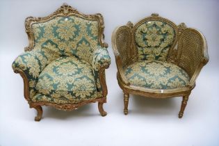 Two mid 20th Century reproduction French style arm chairs with gilt finish to frames.