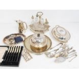 A collection of silver plated items to include; tureen and cover, table condiment set with glass
