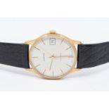 Garrard- a gentleman's 9ct gold Garrard automatic wristwatch, comprising a signed silvered dial with