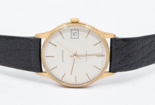 Garrard- a gentleman's 9ct gold Garrard automatic wristwatch, comprising a signed silvered dial with