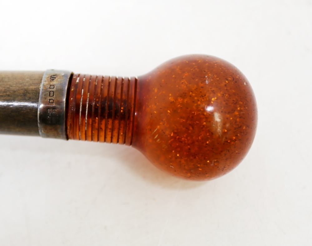 A 20th century wooden handled parasol, with faux amber plastic rounded end and London silver mount - Image 4 of 7