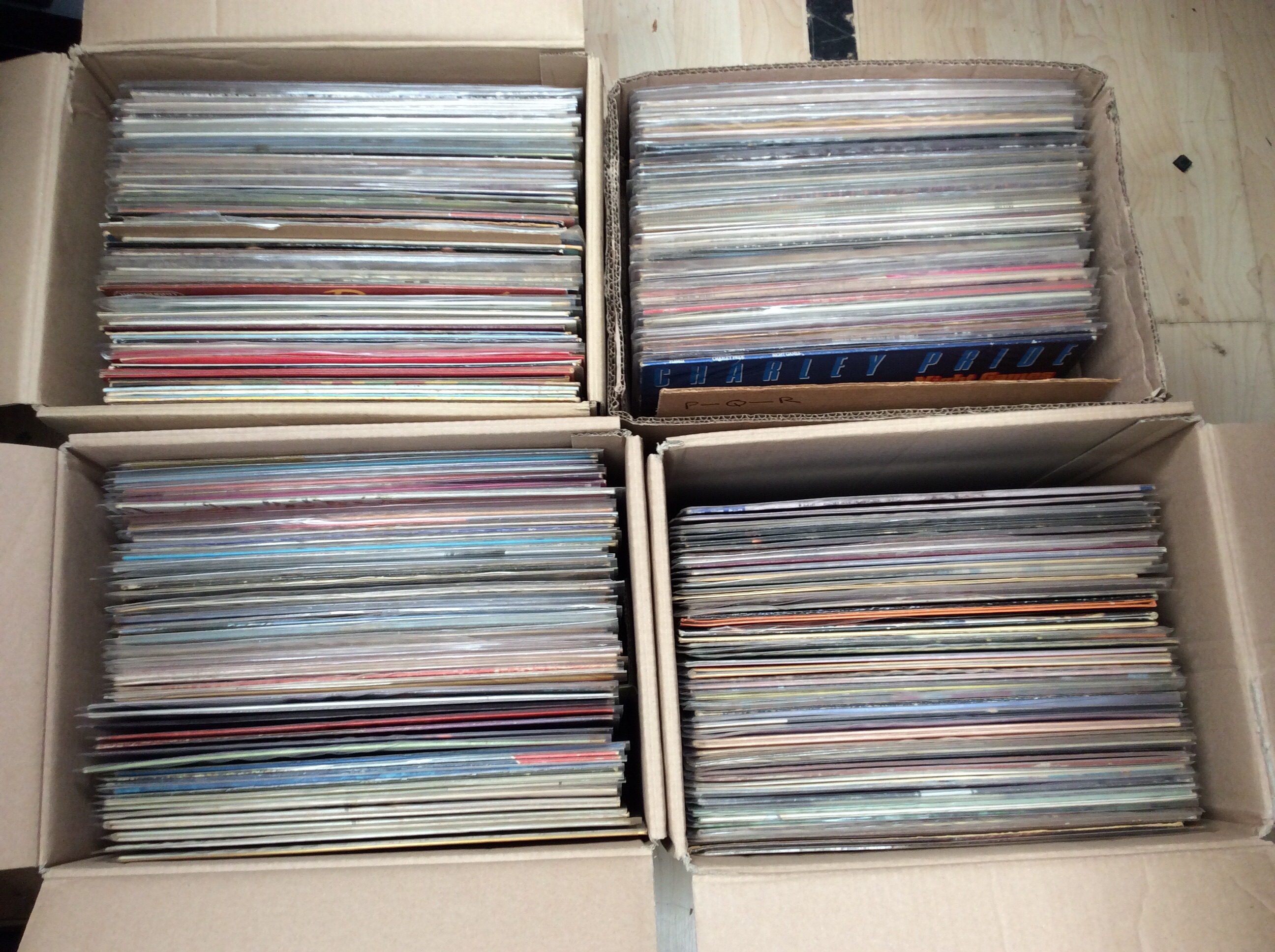 Four boxes of LPs to include Chris Rea, The Shaddows, Marty Robins etc. Approx 200 records.