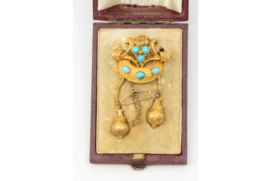 A Victorian turquoise and gold set brooch, comprising an engraved crescent and cuir roule motifs,