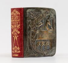 An Edwardian silver mounted The Royal Bijou Birthday Book, red leather bound, silver designed with