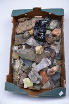 A collection of various rocks and minerals to include: black obsidian, crystalized sulphur,