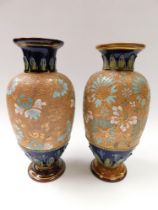 Two Doulton Lambeth and Slaters stoneware vases, of ovoid form, enamelled with turquoise and white