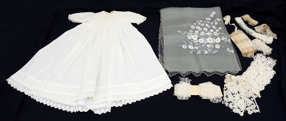 A collection of lace edging in various condition to include a wide deep cream lace piece of strips
