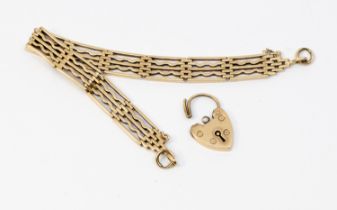 A 9ct gold fancy link gate bracelet, width approx 9mm, length approx 18.5cm, padlock clasp detached,