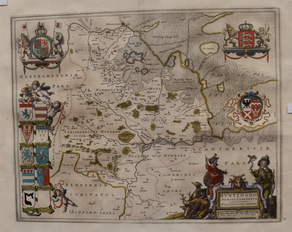 An 18th Century map of Huntingdon, Northampton and Bedfordshire, hand tinted frame.