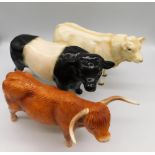 Three cattle figures 1 Beswick Charolais bull , 1 Beswick highland cow with 1 other unmarked figure