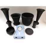 A collection of black Wedgewood to include vase, planter, pots and ashtray along with a Wedgewood