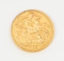 An Edward VII sovereign dated 1903 in a small vintage box