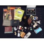 A mixed collectors lot containing costume jewellery, mid 20th Century football mags, Arms purse,