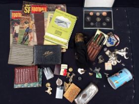 A mixed collectors lot containing costume jewellery, mid 20th Century football mags, Arms purse,