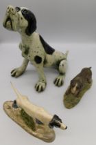 Three dog figures, Larger figure made by the Somerset Guild of Craftsmen , one other marked