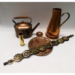 A collection of 19th century brass and copper wares to include; kettles, water jugs, horses brasses,