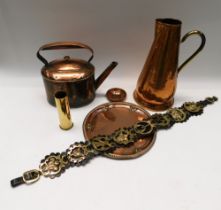 A collection of 19th century brass and copper wares to include; kettles, water jugs, horses brasses,