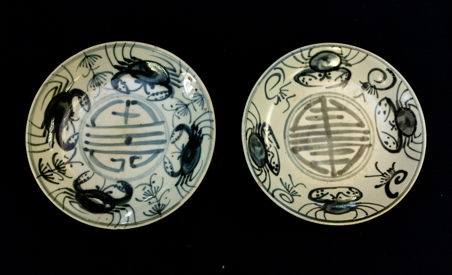 A pair of 19th Century Chinese provincial earthenware dishes, each decorated with crabs around - Image 2 of 6