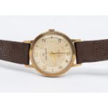 A gents vintage 9ct gold Smith Imperial wristwatch, circa 1950's, comprising a signed champagne dial