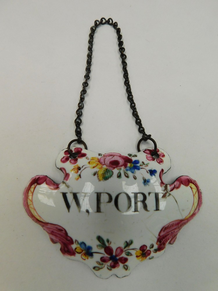 An 18th century Bilston enamel wine label, titled W,PORT, floral design, circa 1760/1770, approx.