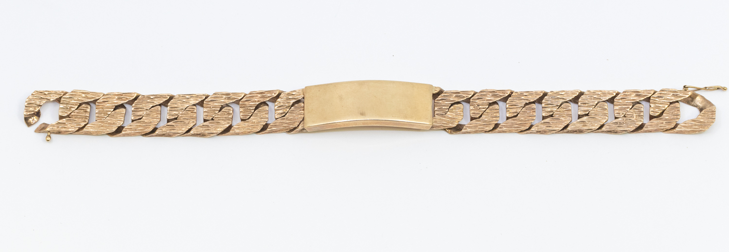 A gentleman's heavy weight 9ct gold textured curb link identity bracelet, width approx 14mm,