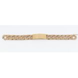 A gentleman's heavy weight 9ct gold textured curb link identity bracelet, width approx 14mm,