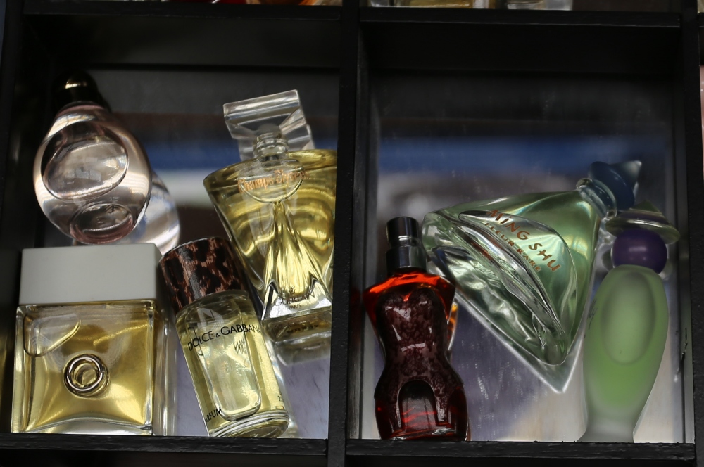 A collection of thirty-eight miniature and sample perfume bottles, comprising vintage and later - Image 3 of 7