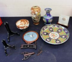 A collection of Chinese and Japanese chargers, bowls, vases, embroidered frame scene cloisonne