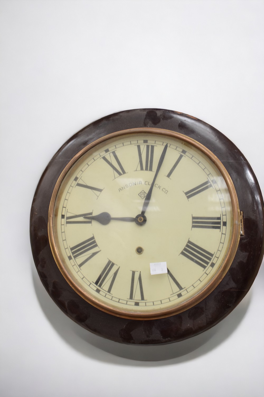 Two early to mid 20th Century 8 day round wall clocks.