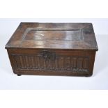 A small 17th Century solid English oak coffer/bible box, with carved front, internal candle box,