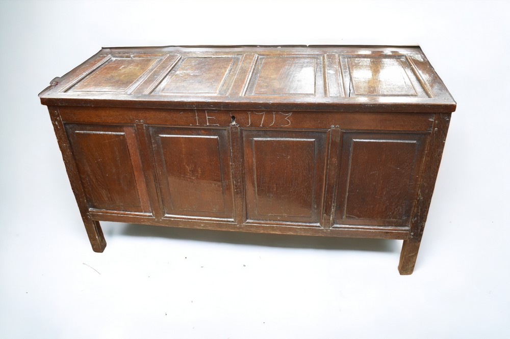 An early 18th Century solid English oak panelled coffer with initials and date carved to front