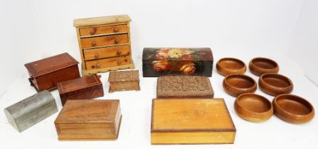 A collection of 20th Century treen boxes with treen bowls.