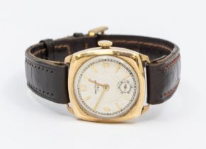 A gentleman's 1940's 9ct gold Waltham wristwatch comprising a signed silvered dial with applied gilt