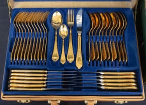 A Royal Solingen 24ct gold-plated 12 place setting cutlery set in a fitted case. Further details:
